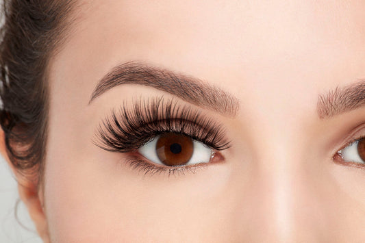 Close-up of Ardell 3D Faux Mink lashes on model, showcasing full volume, soft texture, and dramatic length.