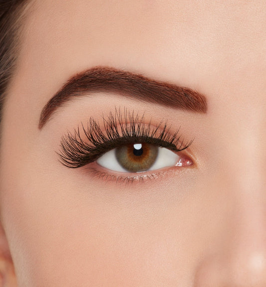 Front view of a model with wearing Ardell Active Lash Pump'n lashes to show how they look on the eye