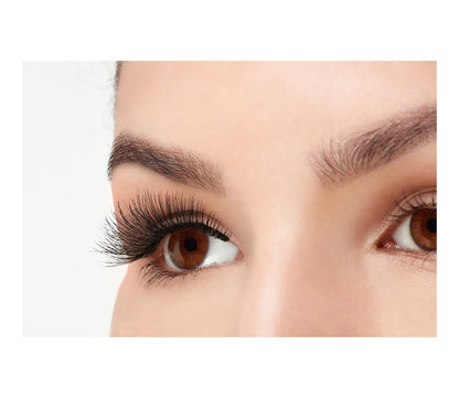 A model wearing Ardell Double Wispies in a side view showing its curly & long length lashes