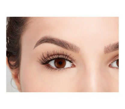 A model with an open right eye wearing Ardell Demi Wispies showing how it looks like when it's worn