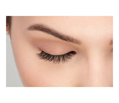 A model with a close right eye wearing Ardell Demi Wispies showing how it looks like when it's worn