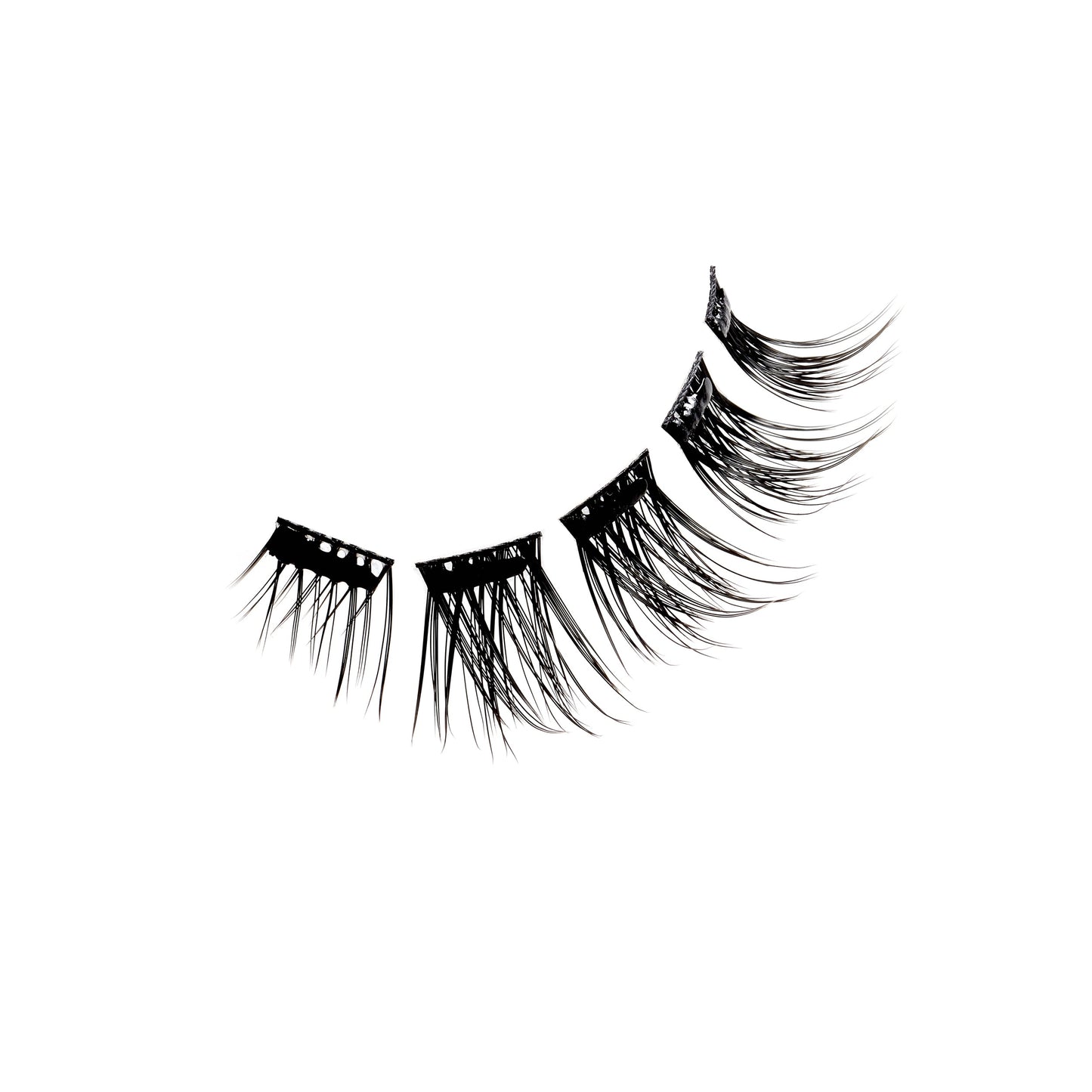 Floating set of Ardell Press-On Wispies Natural Lashes on a white background